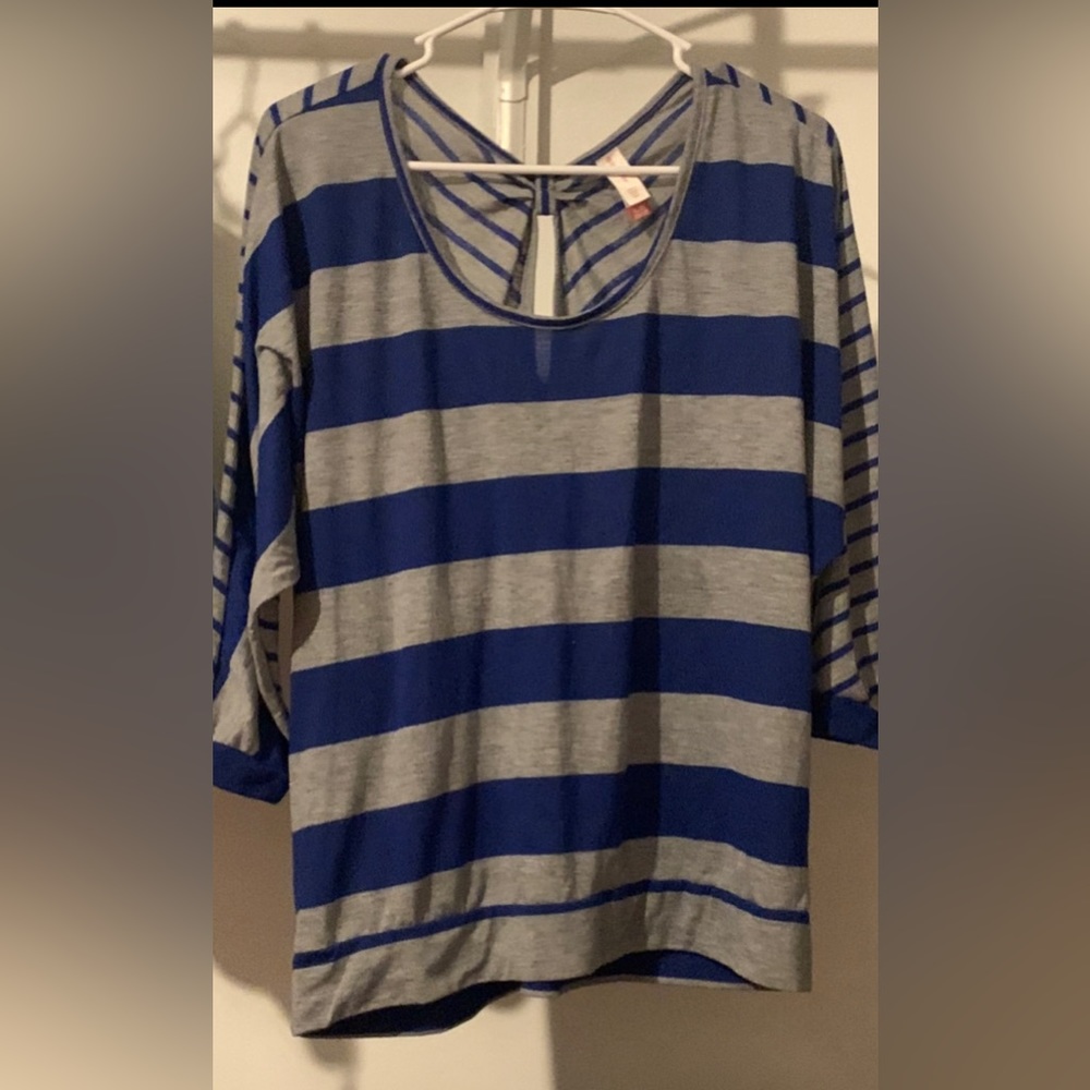 Blue and grey blouse slits in back
